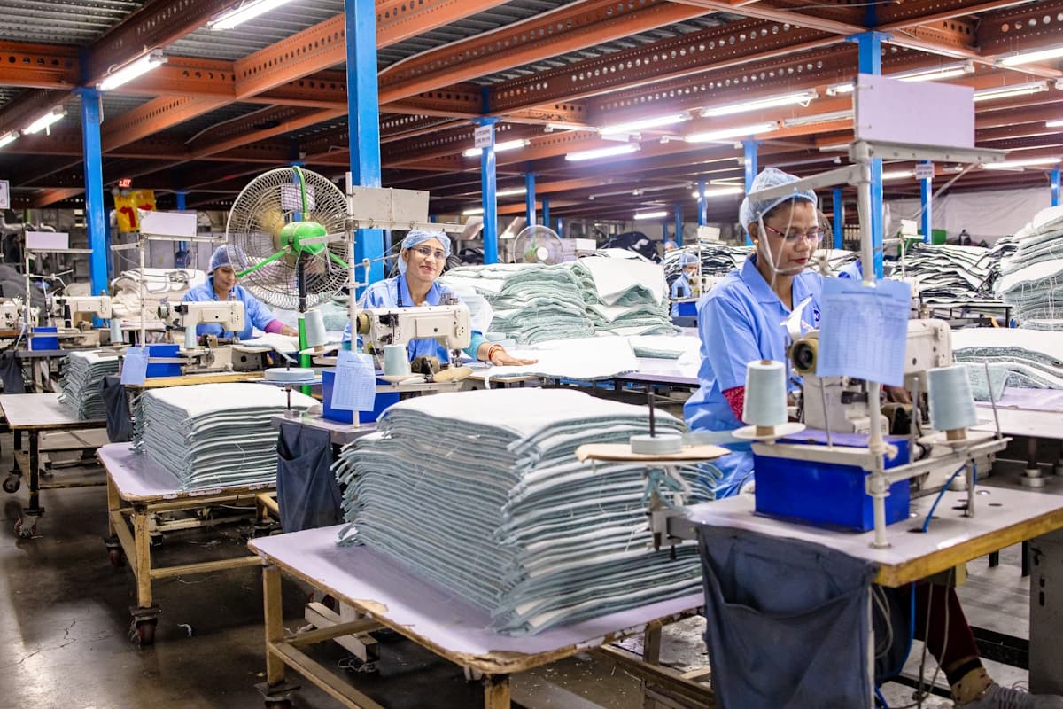 Garment production floor with sewing stations